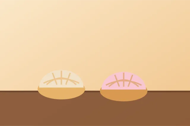 Dos conchas, una de vainilla y una de fresa